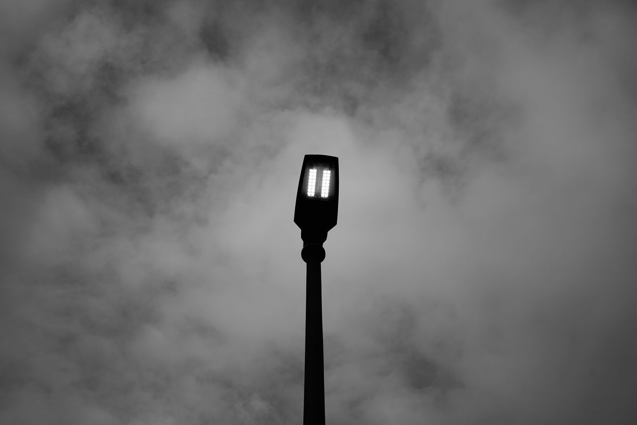 LOW ANGLE VIEW OF STREET LIGHT AGAINST CLOUDS