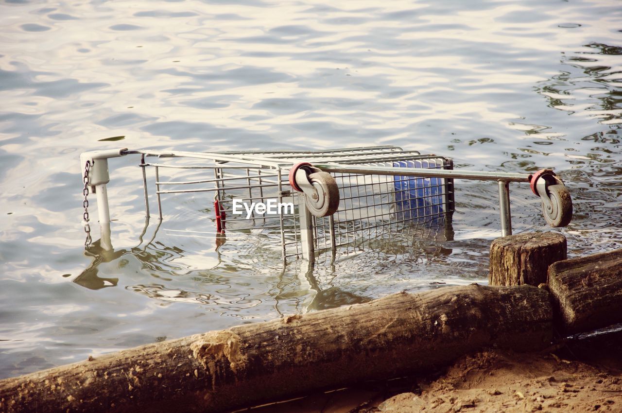 Shopping cart fallen on lake