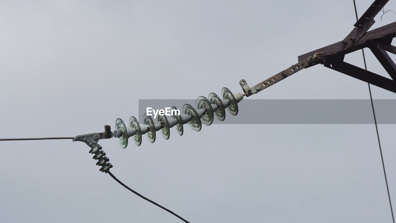 High voltage tower sky background. high-voltage electrical insulator electric line 
