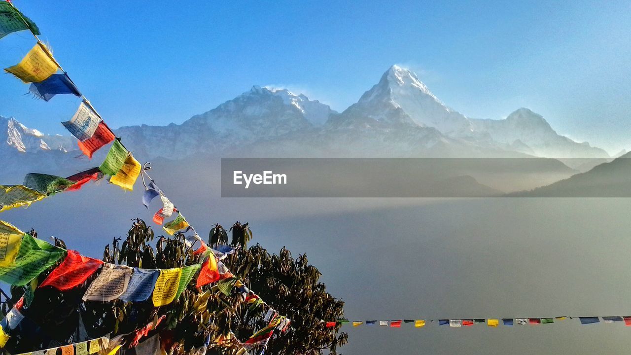 Low angle view of mountain against cloudy sky