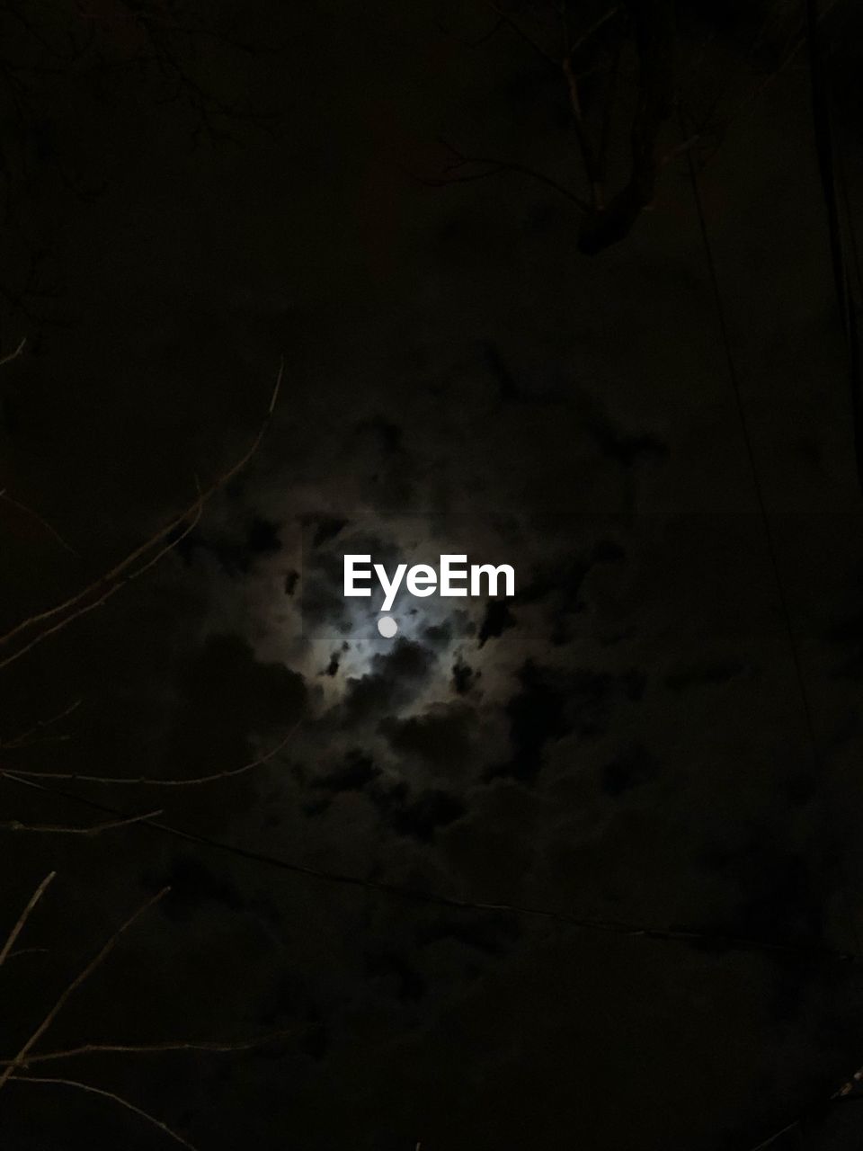 LOW ANGLE VIEW OF MOON AGAINST SKY AT NIGHT