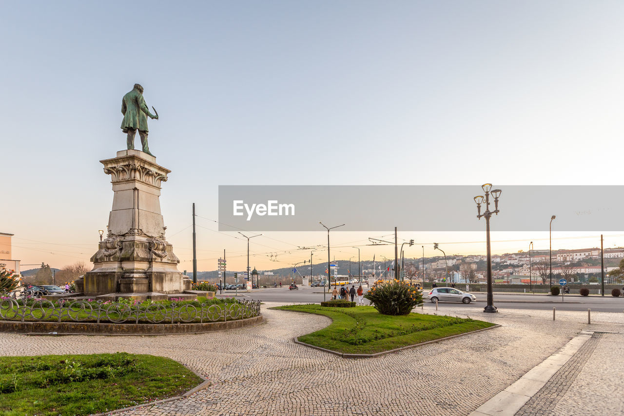 STATUE OF STREET AGAINST SKY