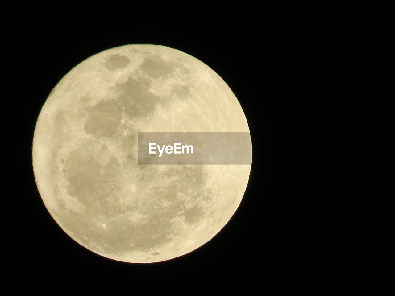 LOW ANGLE VIEW OF MOON IN SKY