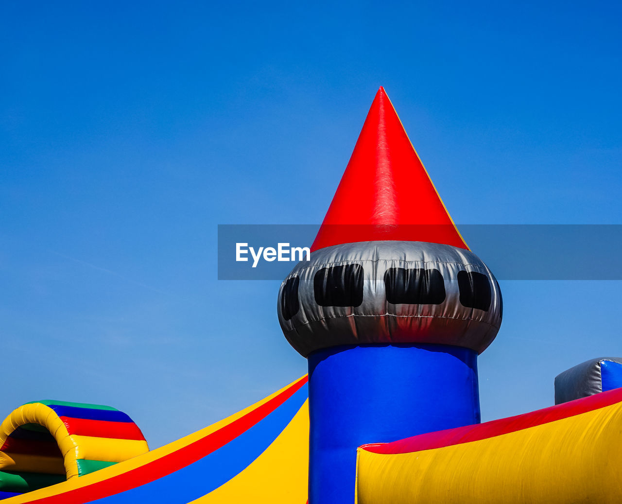 Colourful upper part of a bouncy castle for children at a street festival