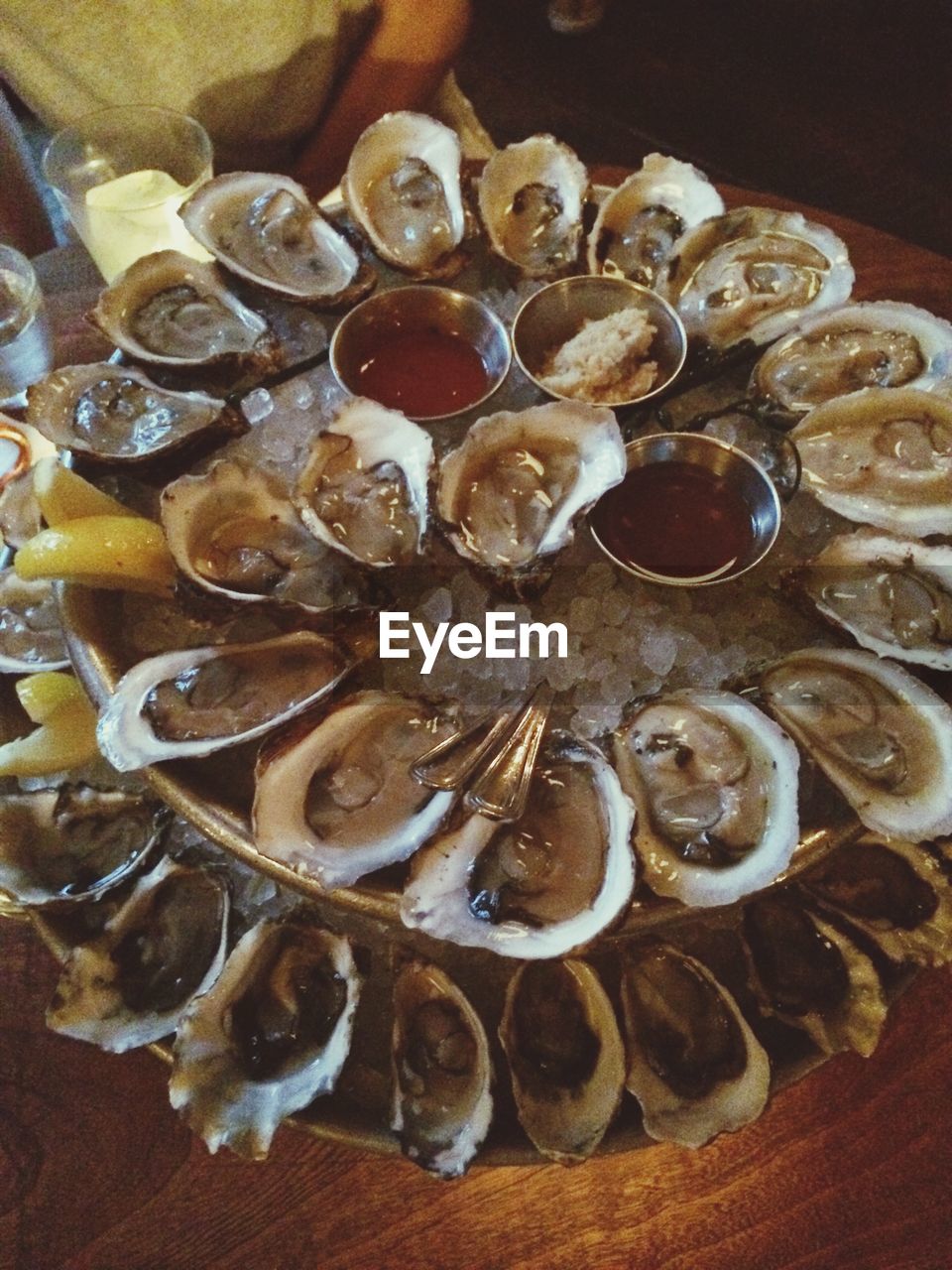 High angle view of oysters served on table