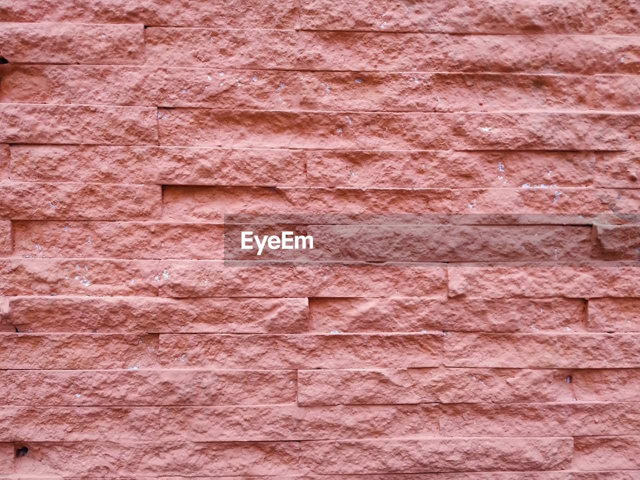 CLOSE-UP OF BRICK WALL