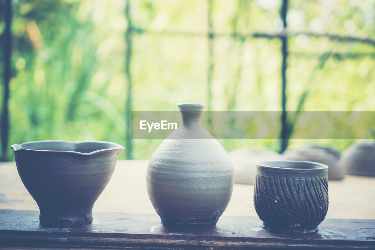 Various pots arranged on table