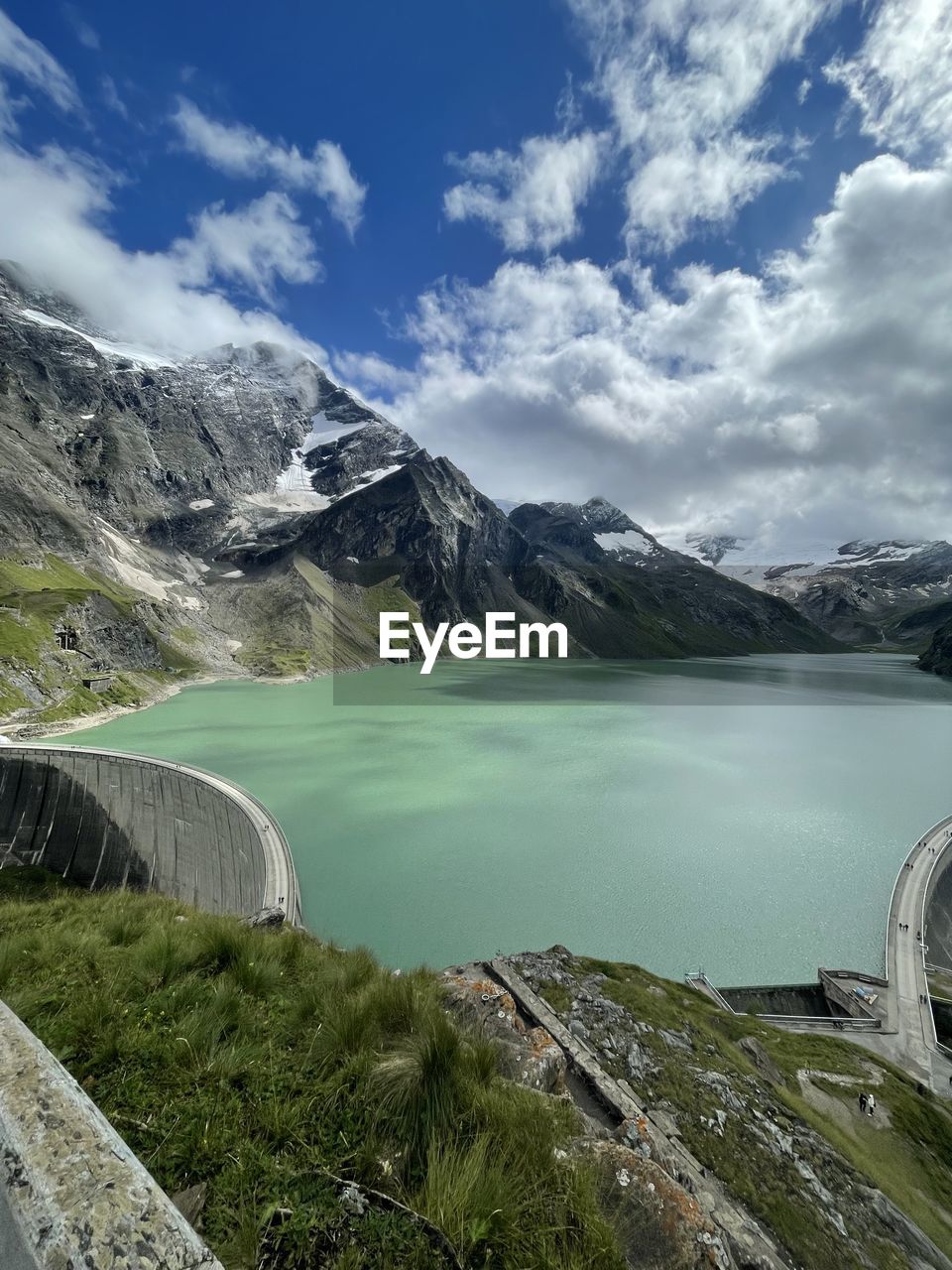 mountain range, cloud, scenics - nature, nature, beauty in nature, mountain, water, environment, sky, no people, aerial photography, landscape, day, travel, terrain, travel destinations, outdoors, land, cliff, tranquility, non-urban scene, tourism, rock, plant, mountain pass, tranquil scene, adventure, panoramic, architecture, idyllic, motion