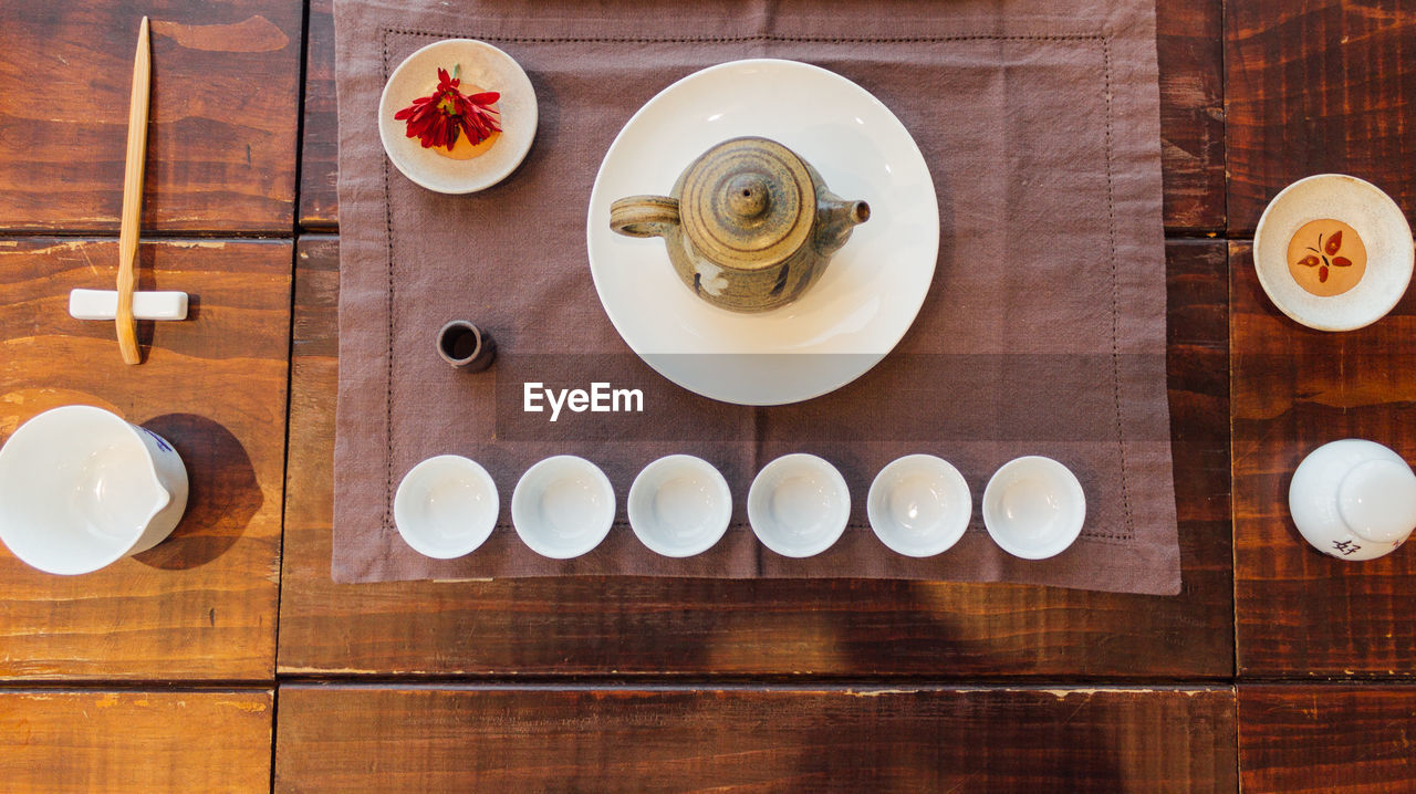 High angle view of crockery on table