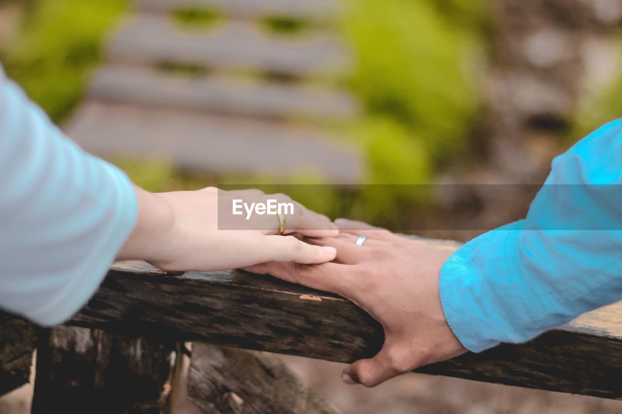 Close-up of hand holding hands