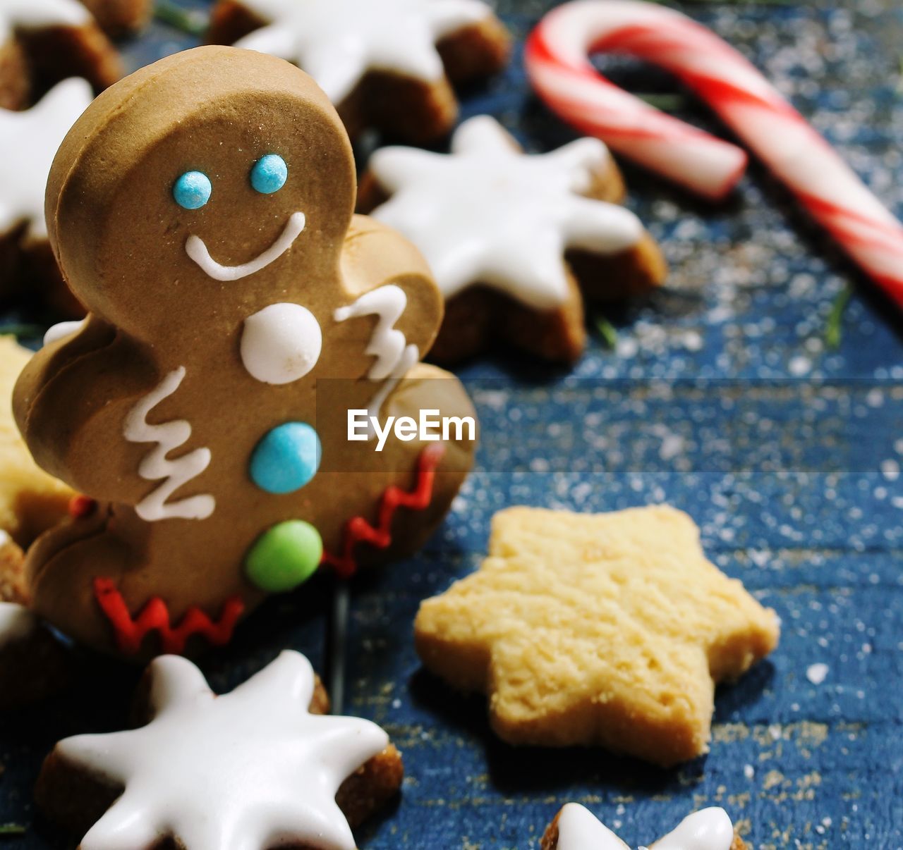 CLOSE-UP OF COOKIES ON TABLE WITH CHRISTMAS