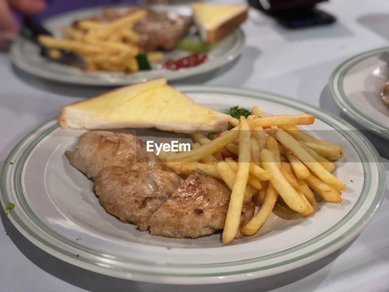 CLOSE-UP OF FOOD ON TABLE