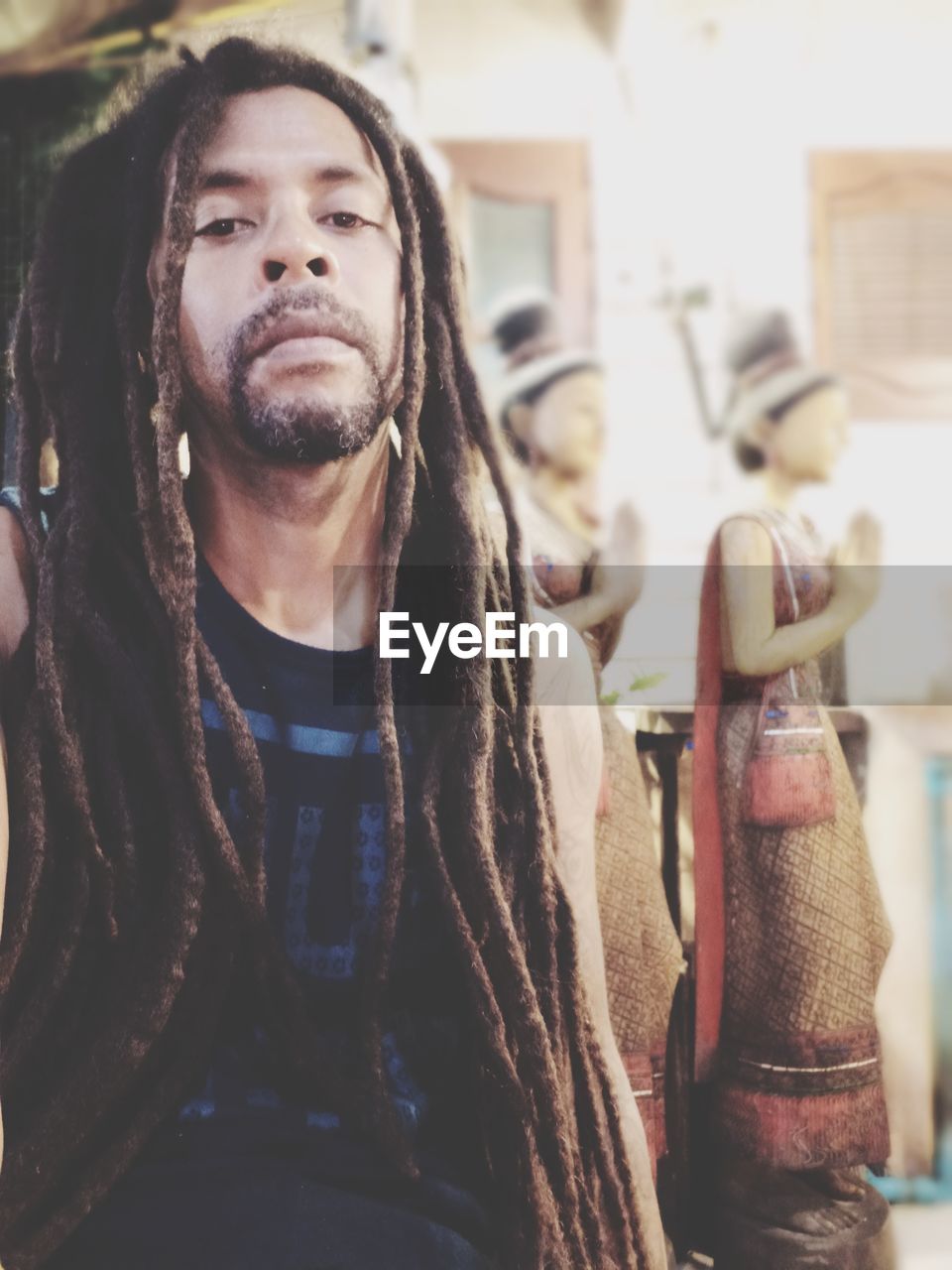 Portrait of man with long dreadlocks