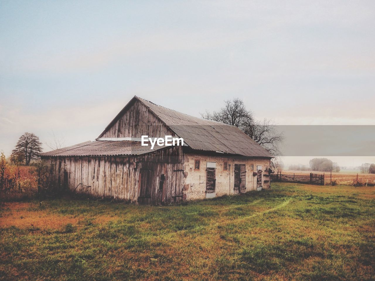 House on field against sky