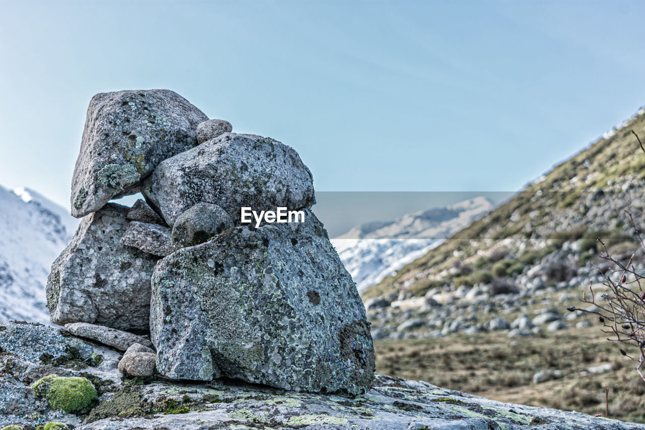 A stone house on the mountain in sunny day