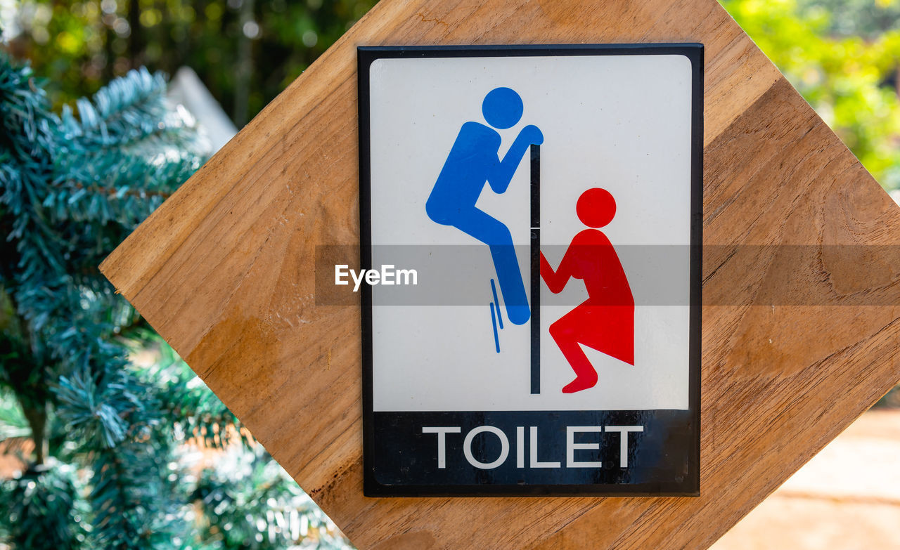 Toilet sign post of outdoor toilet.