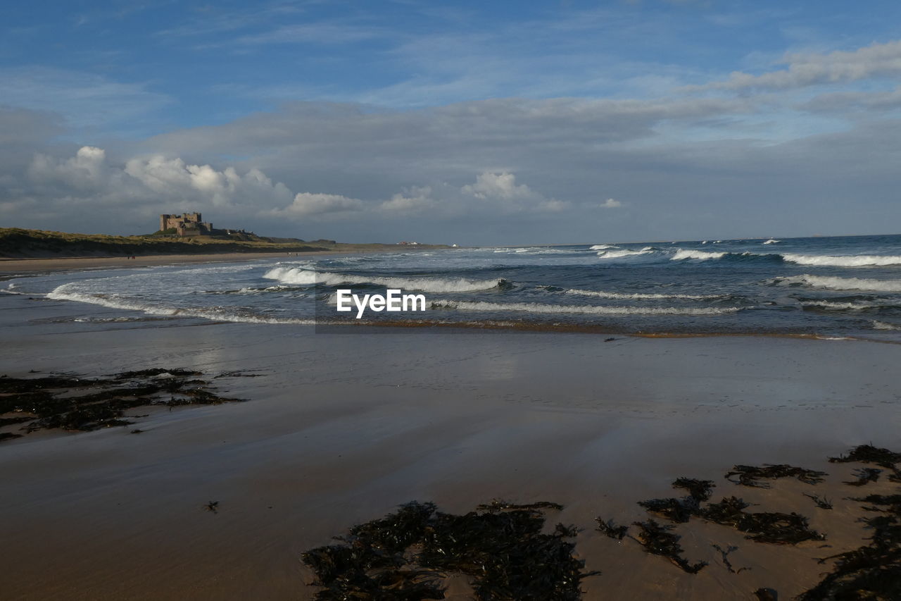 Scenic view of beach against sky