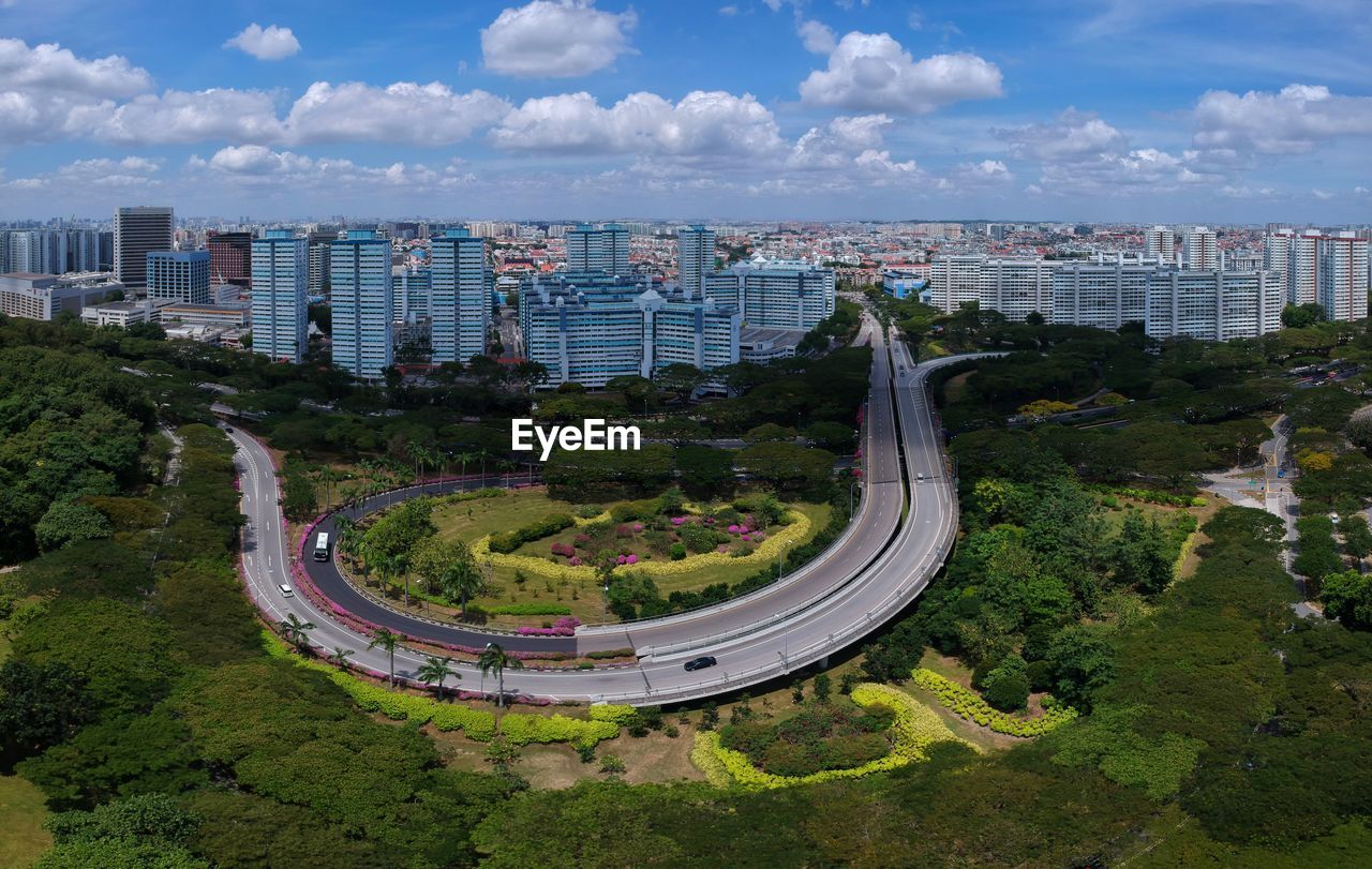 High angle view of road amidst buildings in city