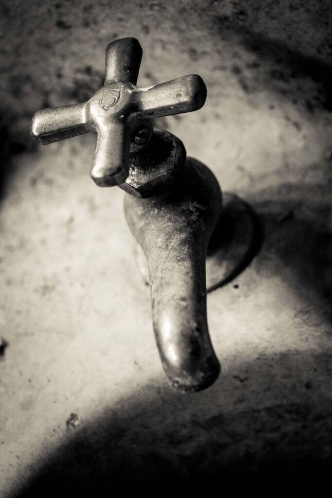 Close-up of old tap