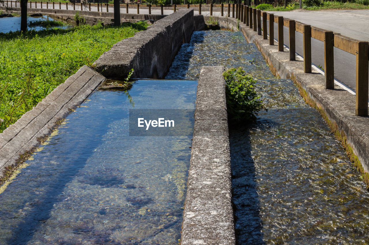 High angle view of footpath by canal santa maria del molise