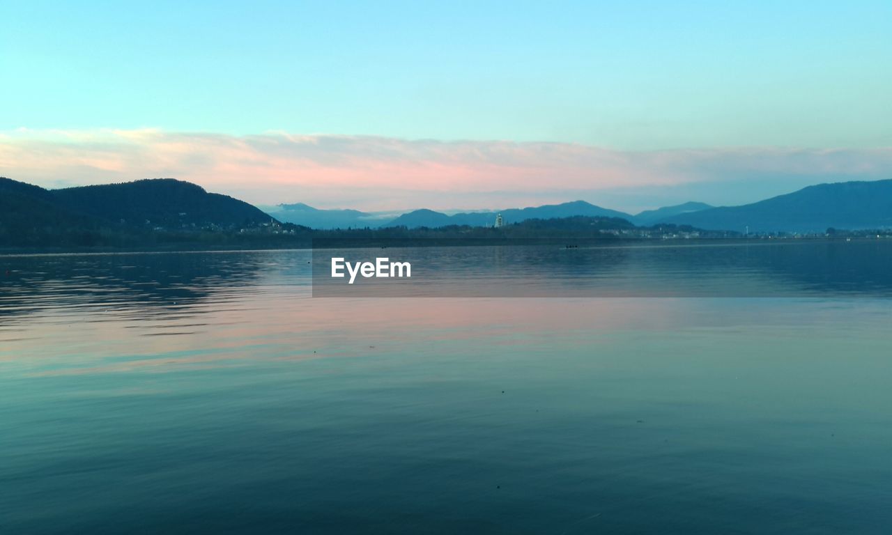 View of lake with mountain range in the background