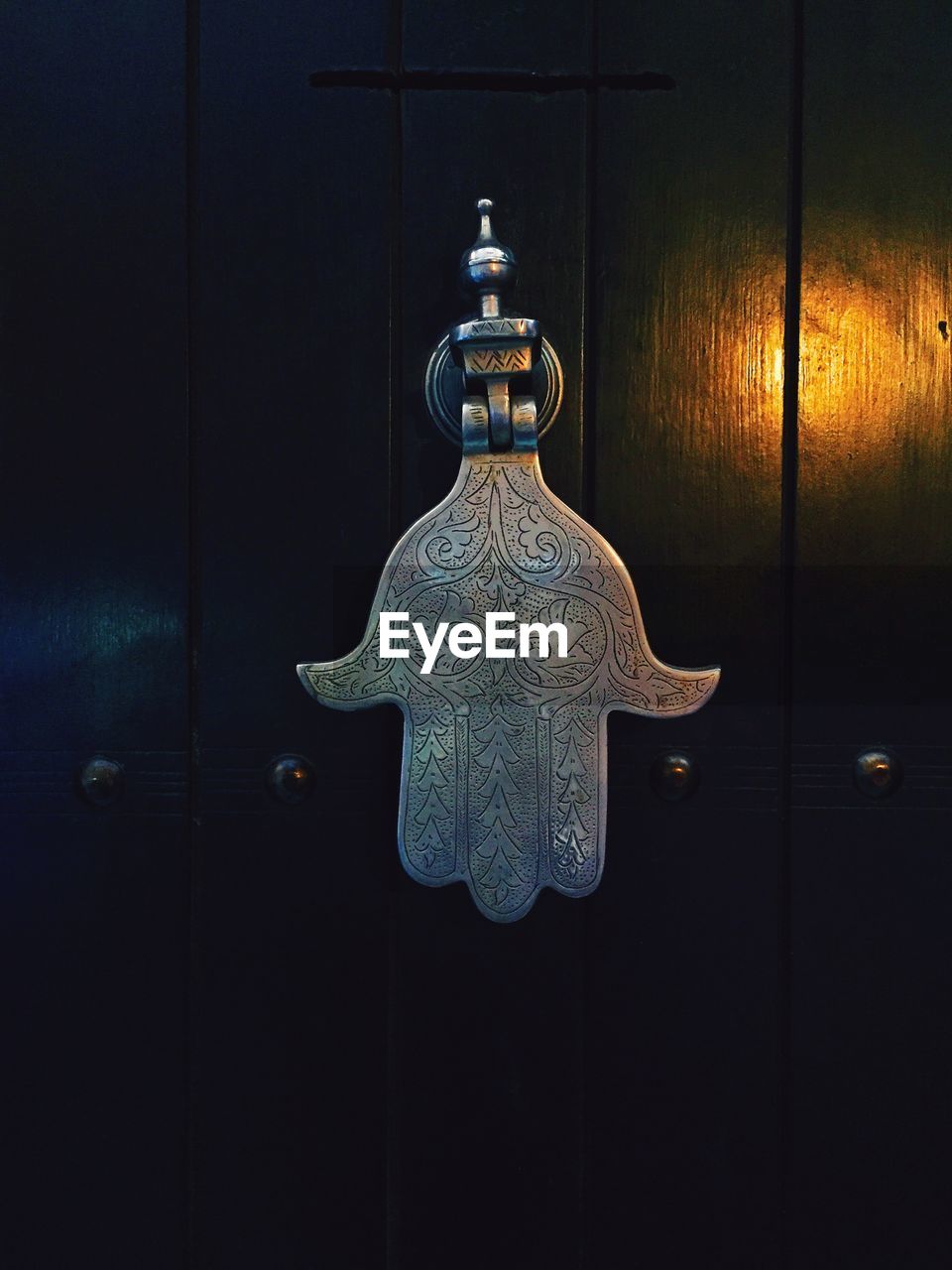 Close-up of ornate metal doorknocker