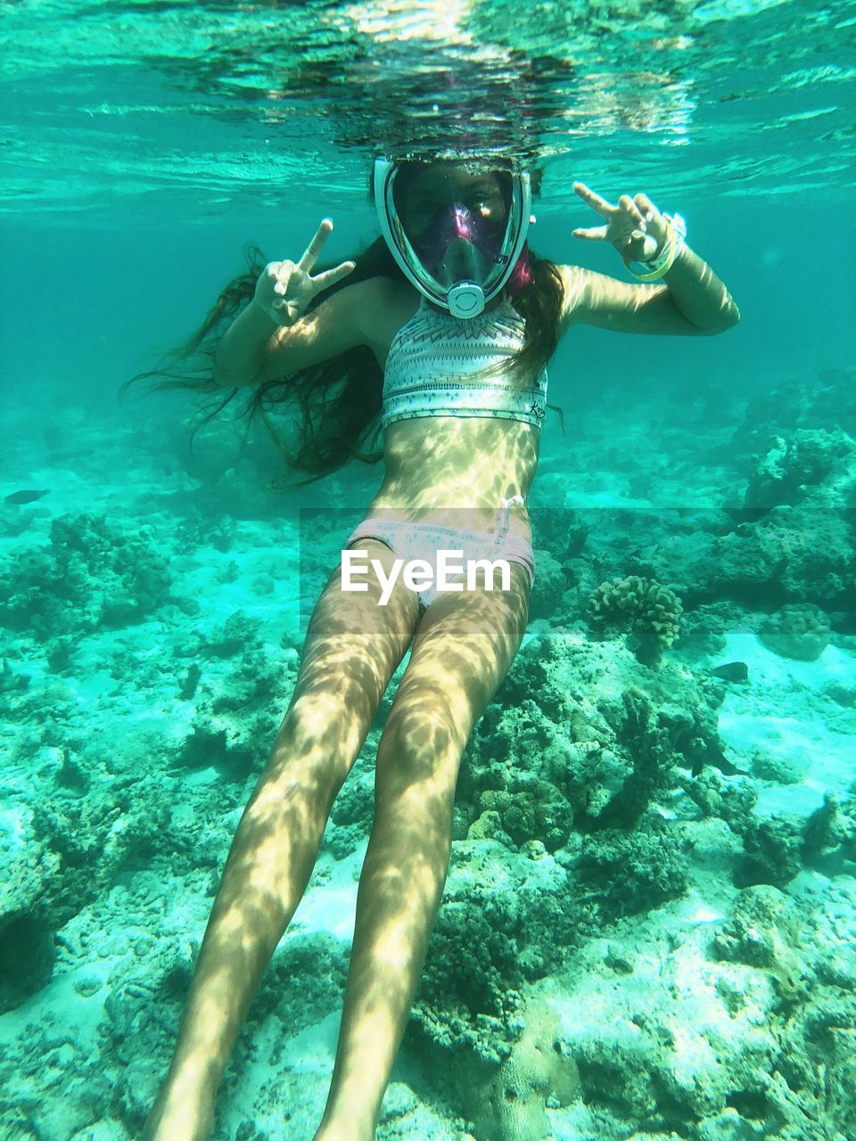 Woman swimming in sea