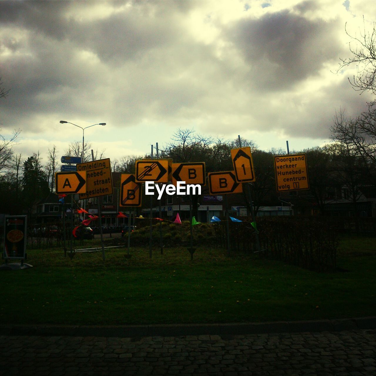 Yellow signs in park