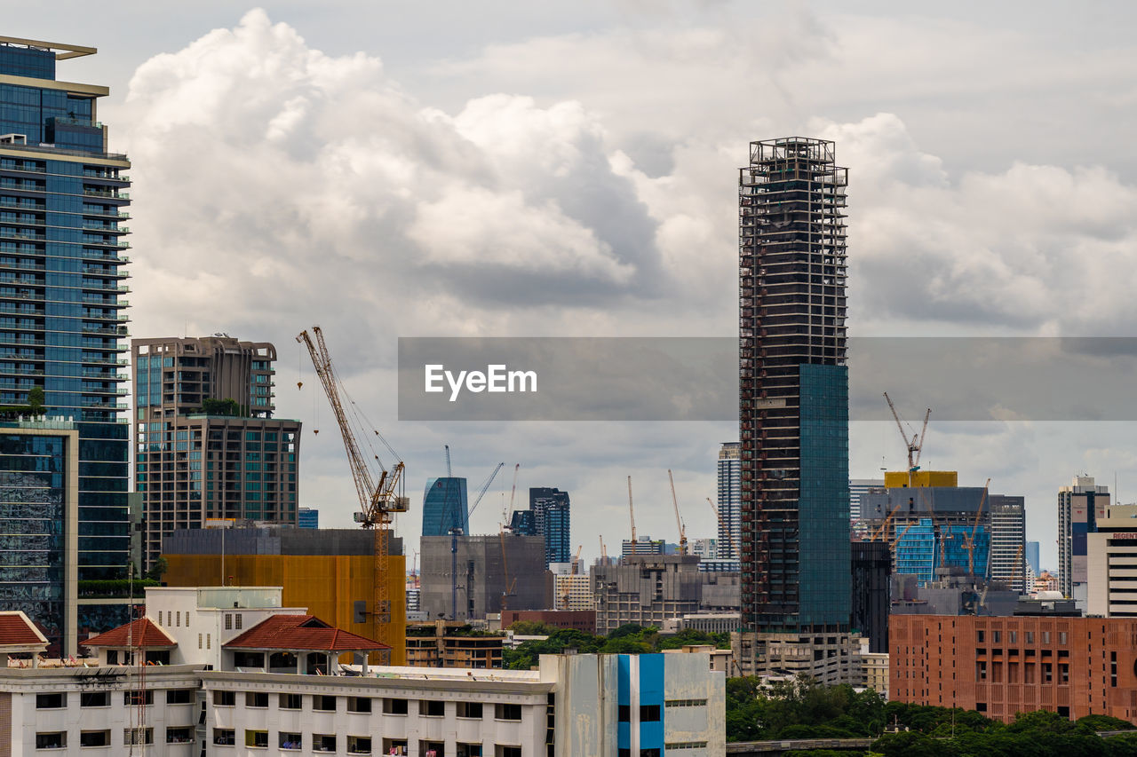 Bangkok, thailand - 12 august 2022 - view of bangkok cityscape high-rises and bts skytrains