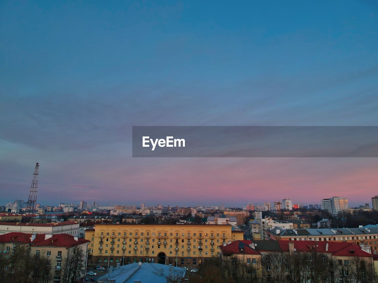 High angle view of townscape against sky at sunset