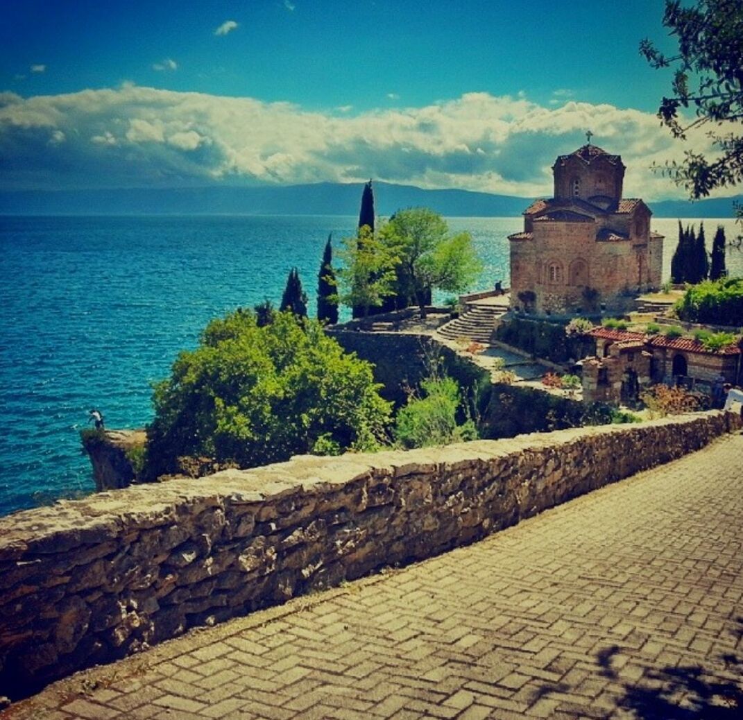 VIEW OF CALM SEA AGAINST SKY