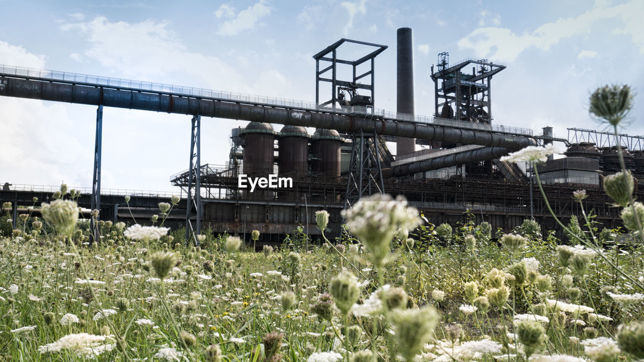 View of factory against sky