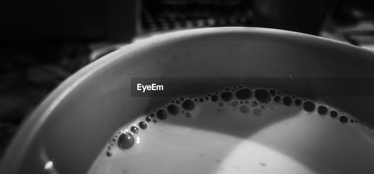 HIGH ANGLE VIEW OF COFFEE IN CUP