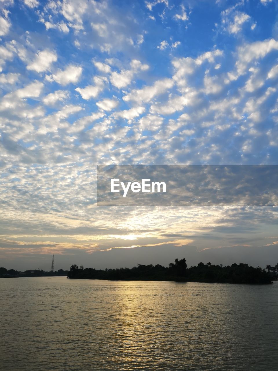 VIEW OF LAKE AGAINST SKY DURING SUNSET