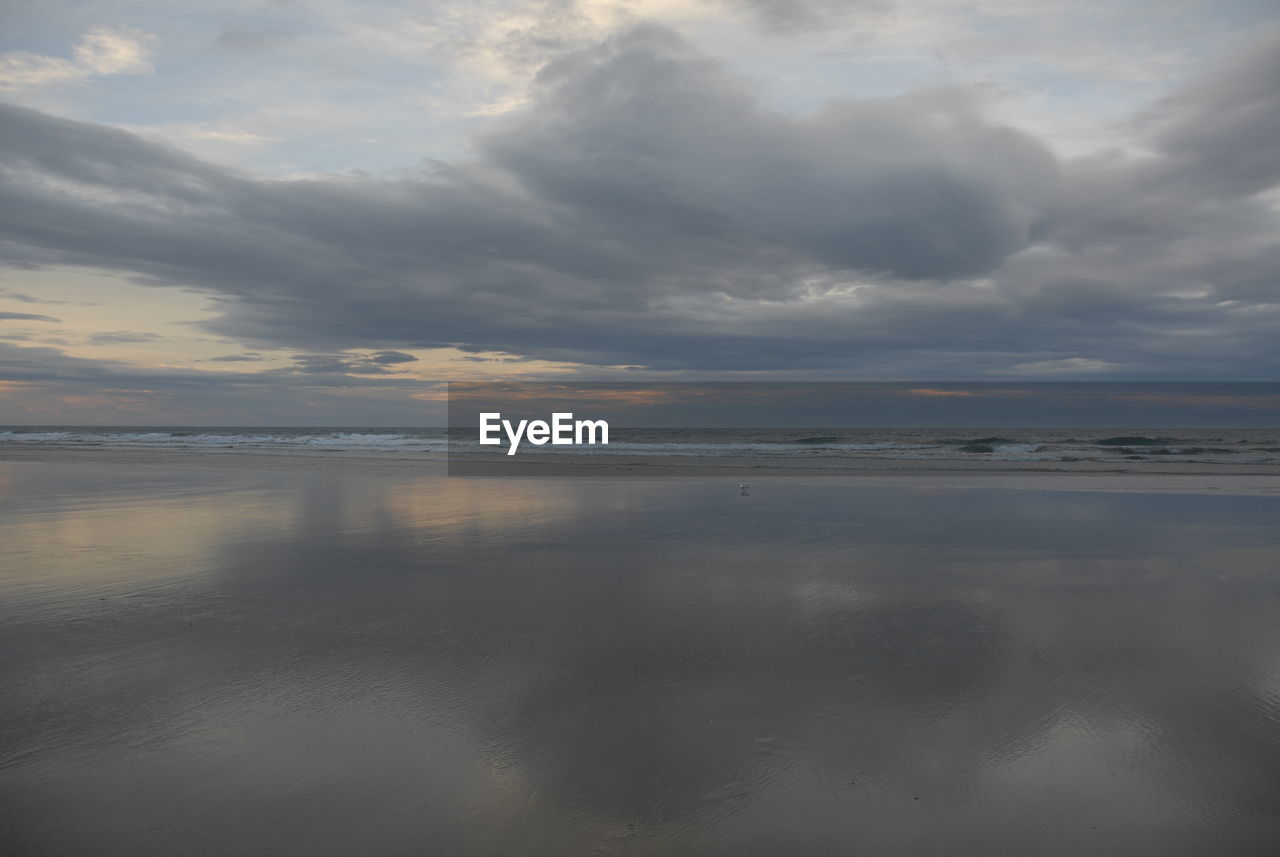 VIEW OF BEACH AGAINST SKY