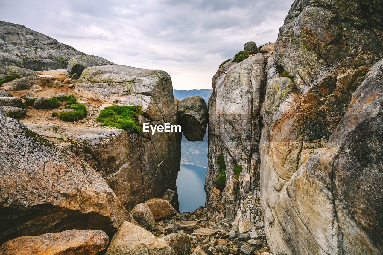 Panoramic view of rock formations against sky