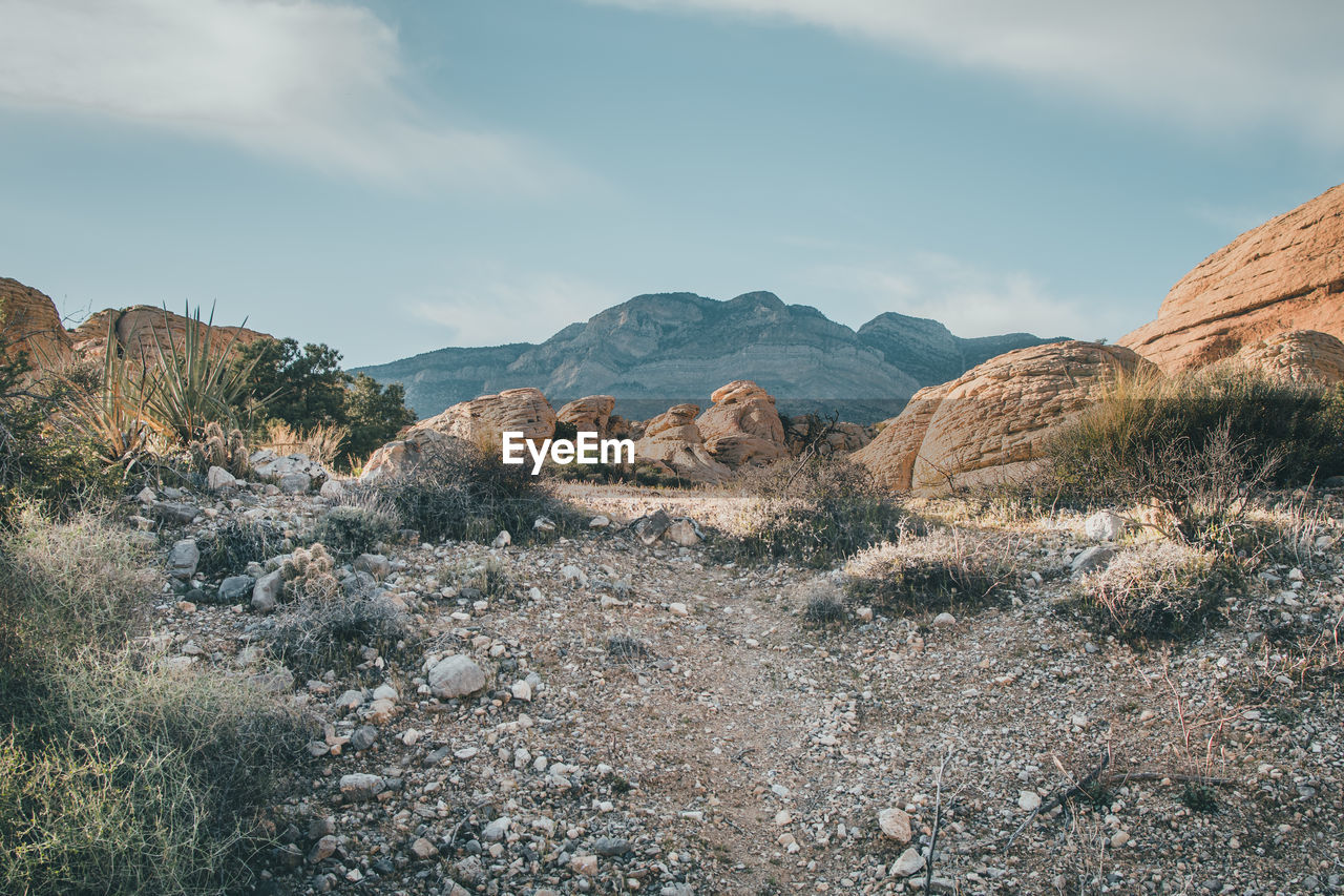 View of rock formations in desert against sky