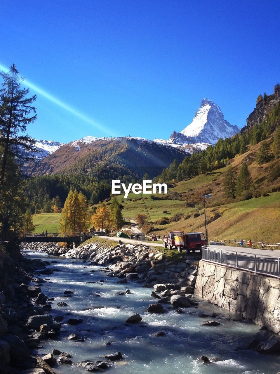 View of countryside stream along landscape