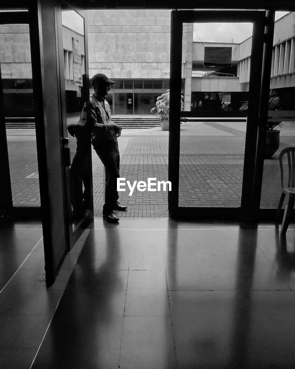 MAN WALKING AT SUBWAY STATION