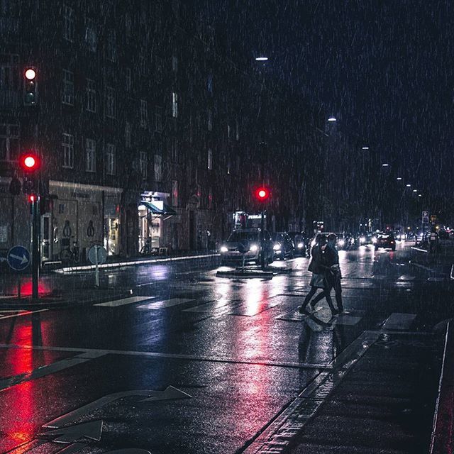 STREET LIGHTS ON ROAD AT NIGHT