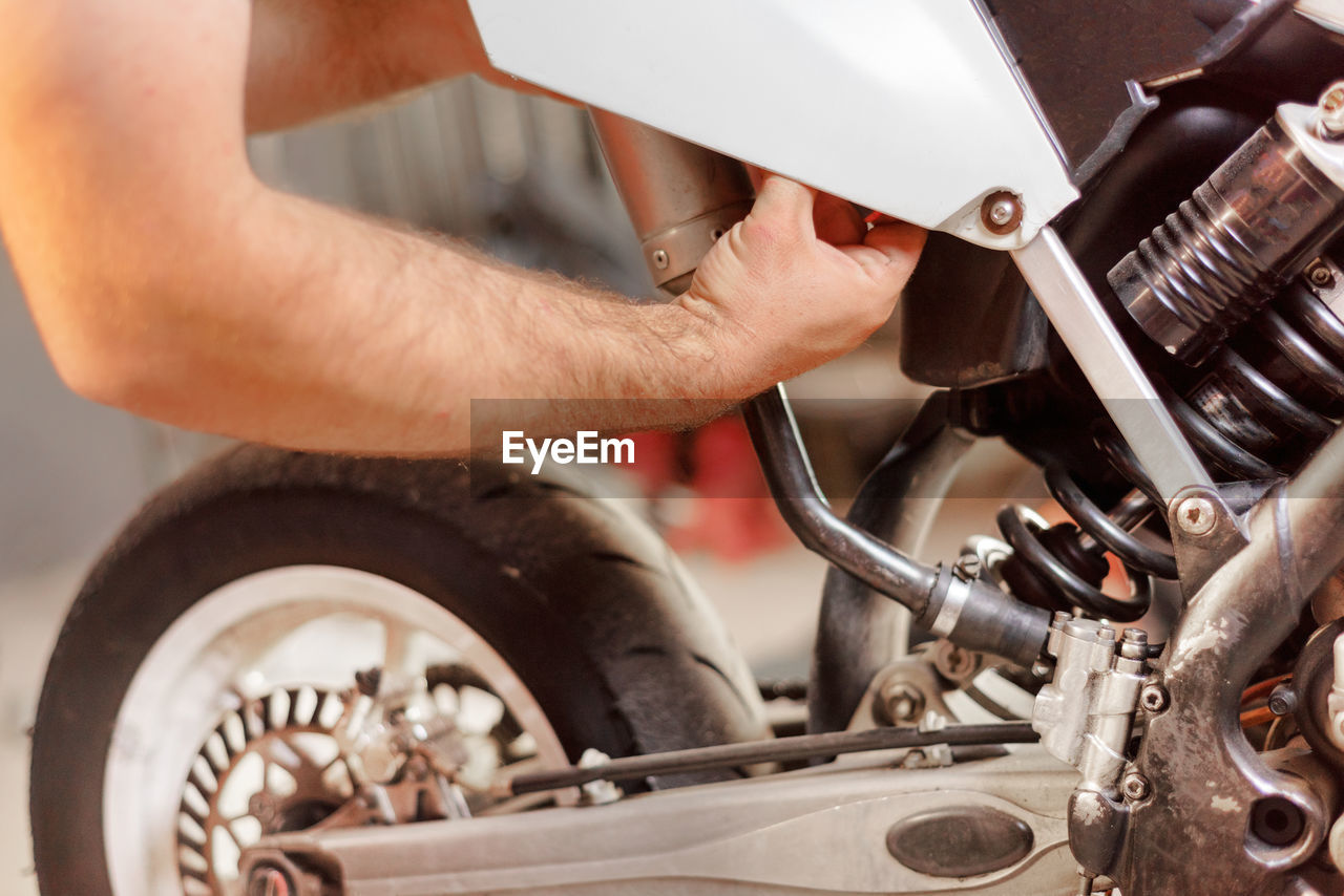 Man working on motorcycle