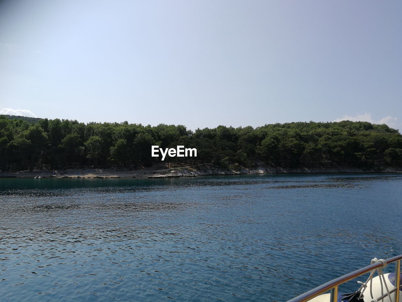 Scenic view of lake against clear sky