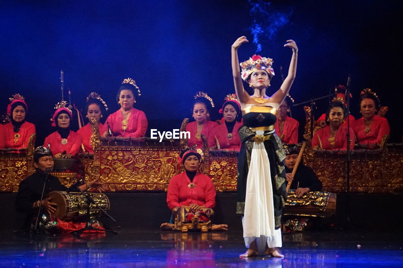 GROUP OF PEOPLE IN TRADITIONAL CLOTHING