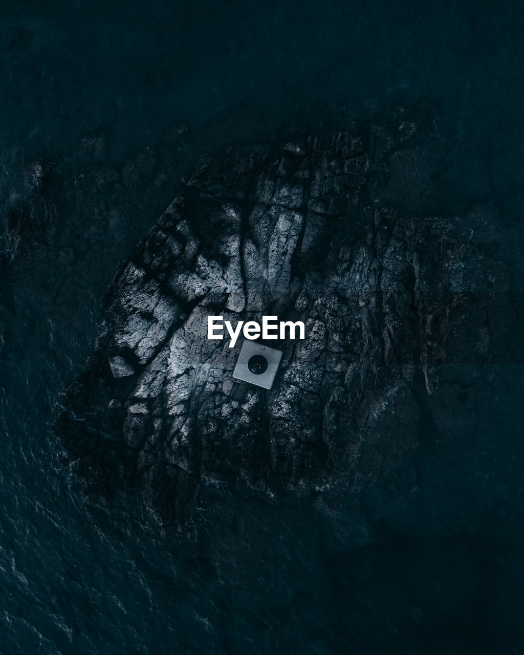 Drone view of rock formation in sea