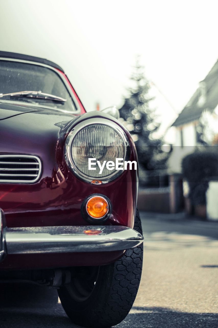 VINTAGE CAR ON ROAD