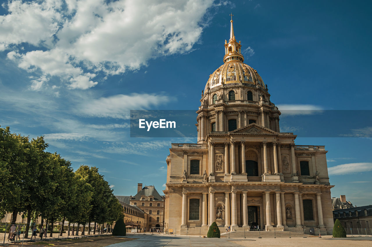 Front facade of les invalides palace with the golden dome in paris. the famous capital of france.