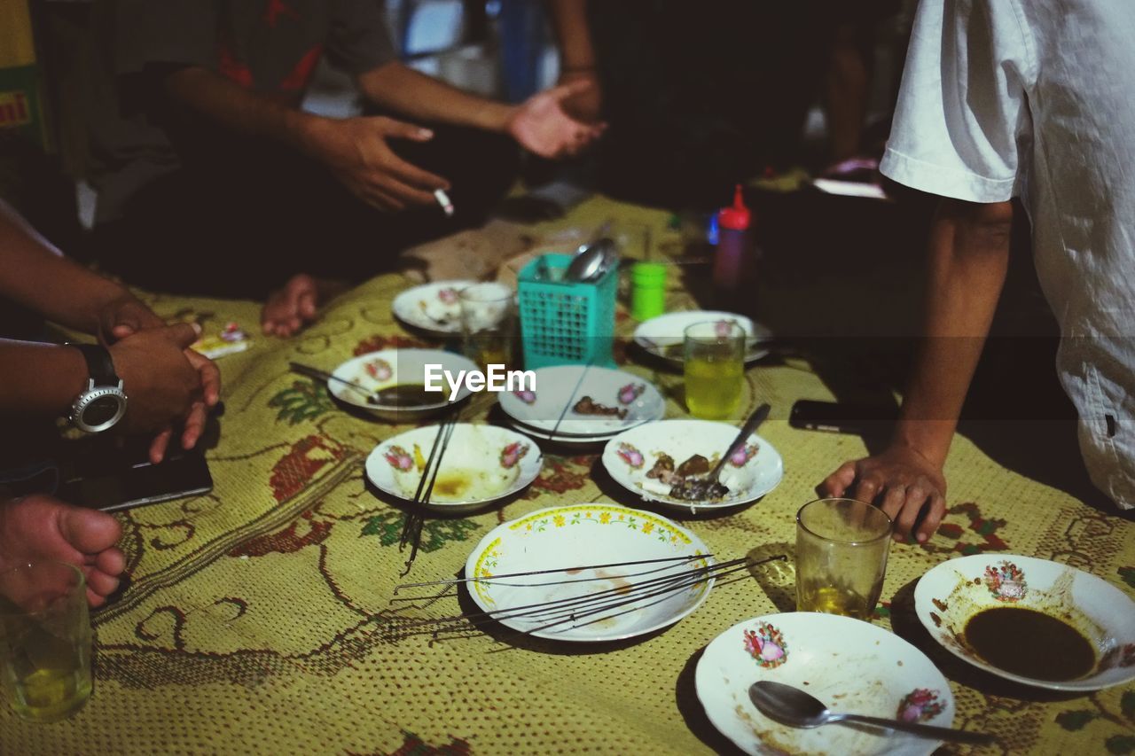 Friends having food at sate klathak pak baris