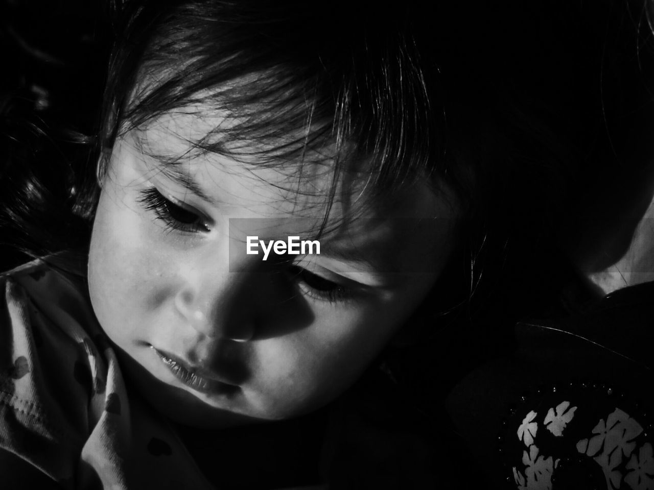 CLOSE-UP OF BABY GIRL WITH EYES