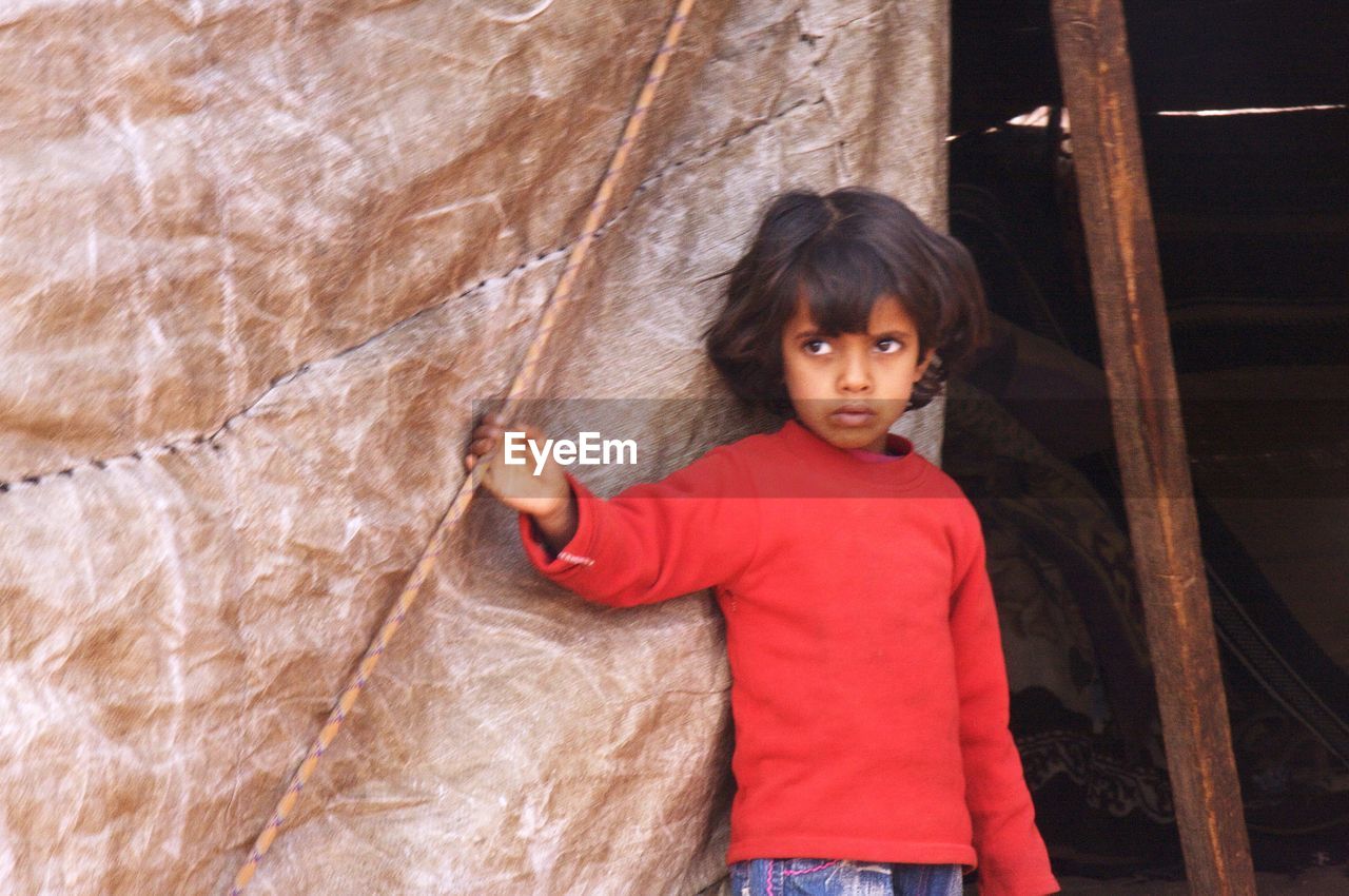 Girl standing outdoors