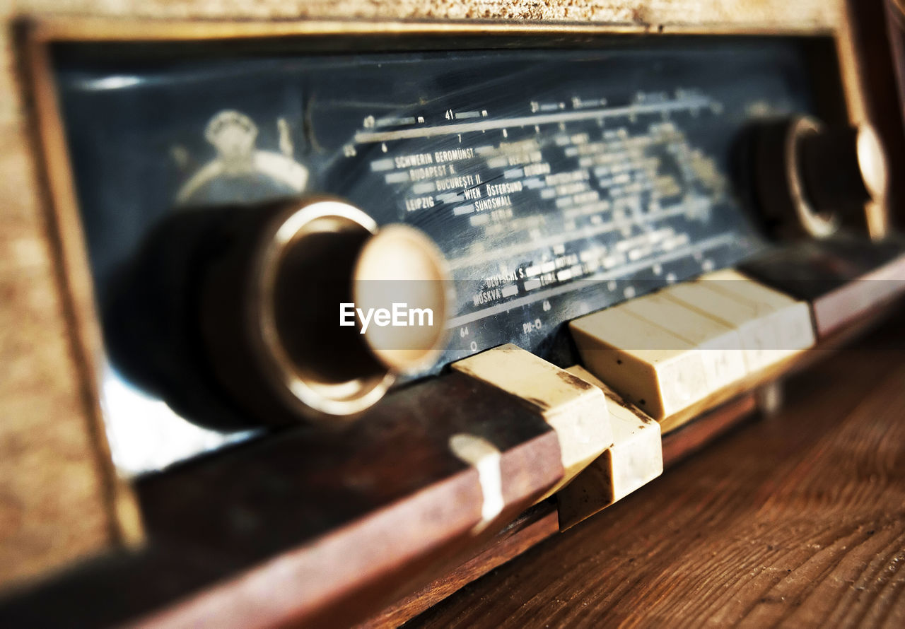 Close-up of old radio on table